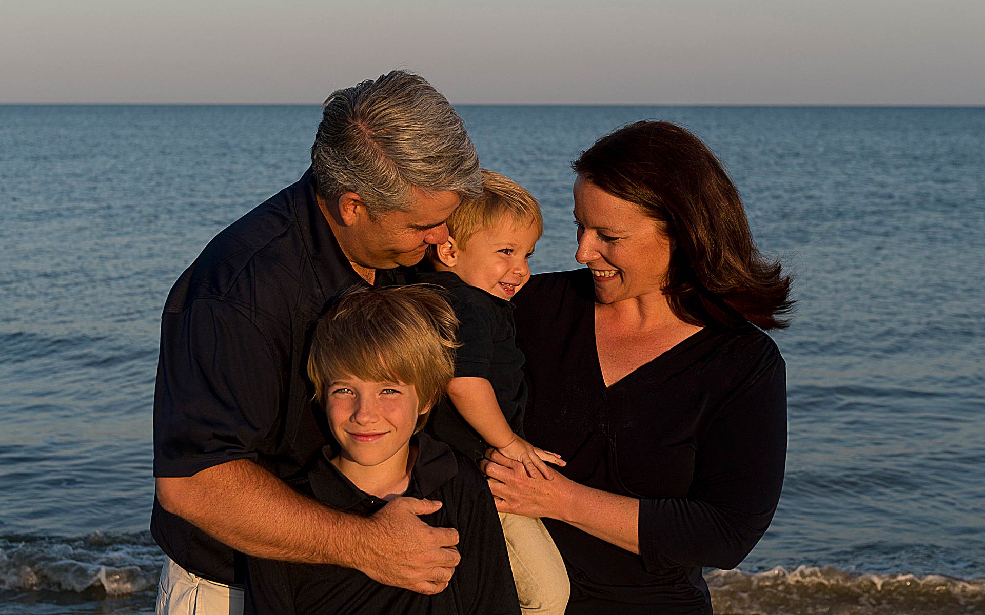 family photo on beach of Hilton Head